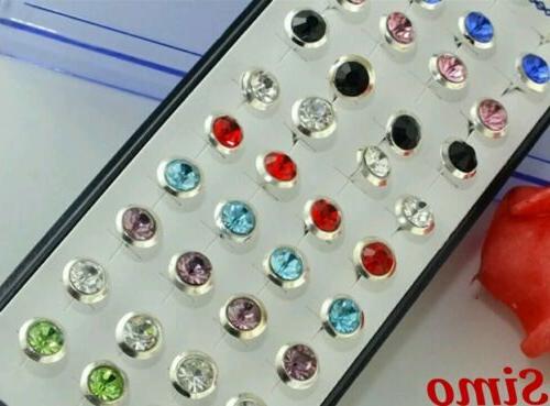 orecchini uomo donna punto luce argento vari