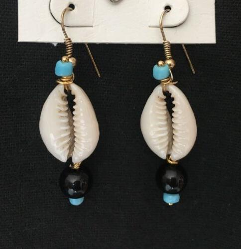 paio orecchini pendenti con conchiglia e perle