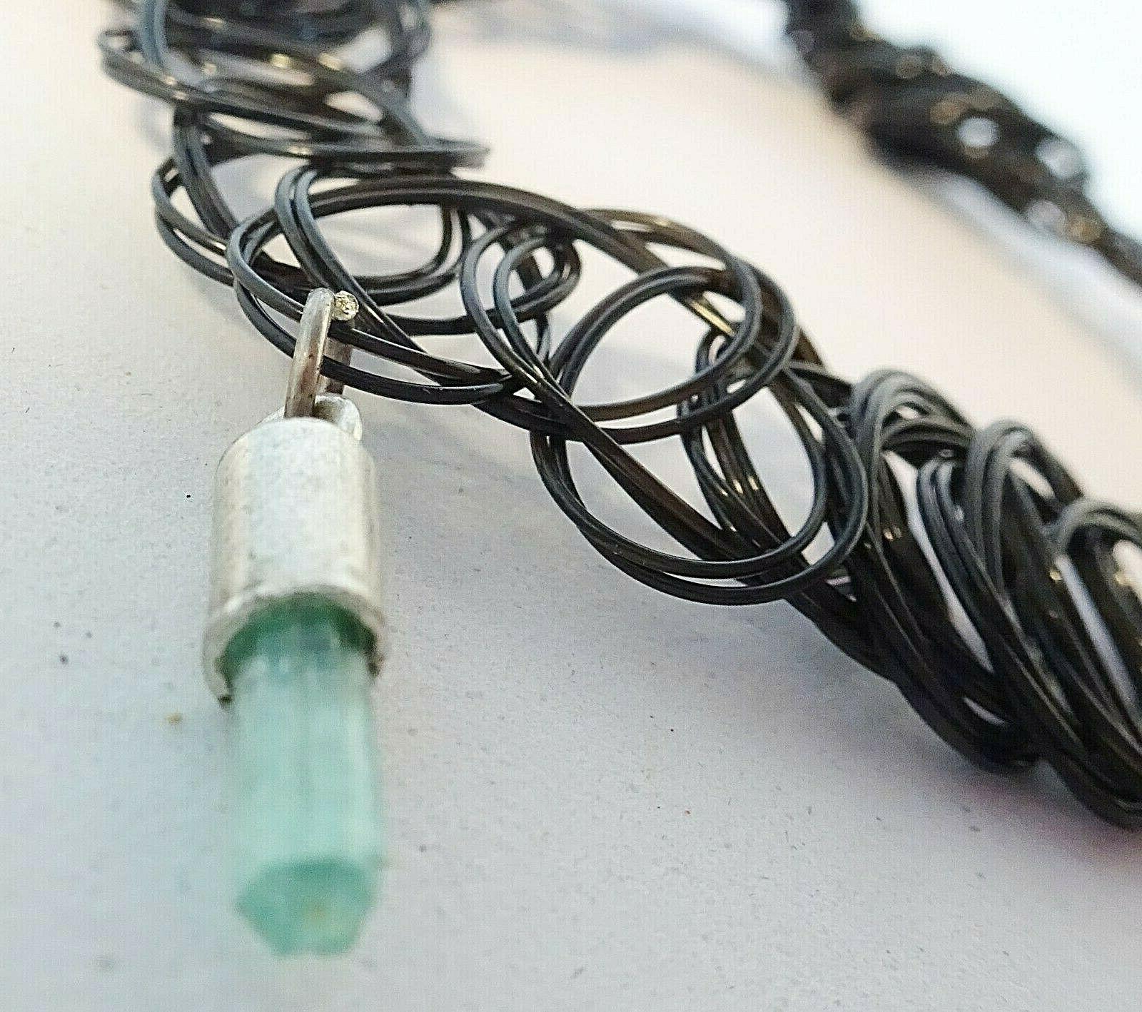 pendente esagonale a smeraldo grezzo in argento