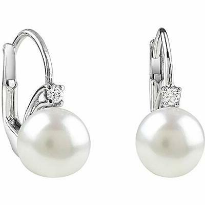 prime coppia orecchini oro bianco e diamanti