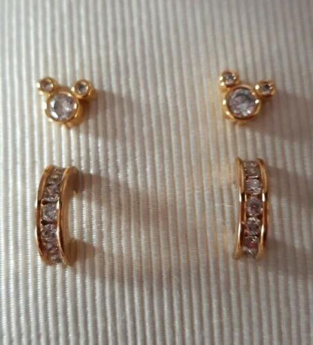 set 2 paia orecchini piercin pave mk