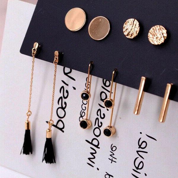 set 5 paia orecchini dorati perno pendenti