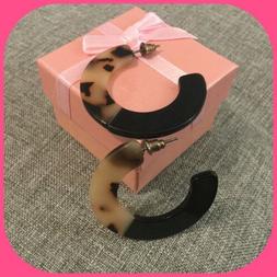 A Cerchio Maculati Marroni. Orecchini Alta Bigiotteria Con C