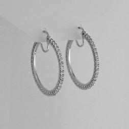 A Cerchio Oro Bianco 18 Kt  Diamanti Ct 0.22 H-vvs