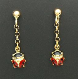 Bambina In Oro Giallo 18 Ct E Smalti Da Gioielleria Amadio