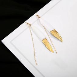 orecchini da donna pendente piuma con punta