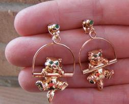 Estrosi Gatti Sull'altalena Dorati Oro 14 Kt Demirouge Swaro