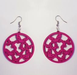 In Legno&nbsp; Filigrana Colore Fucsia.misure: Diametro 4,5 Cm