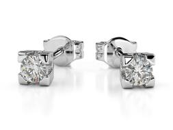 Oro Bianco 18 Kt. Con Diamanti Naturali Da 0.06 Punto Luce D