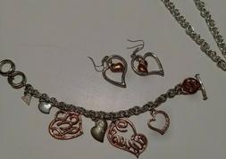 Parure Collana- Bracciale-Orecchini GUESS Originali  usati b