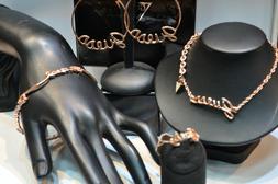 Guess Parure girocollo,bracciale,orecchini,anello ros&egrave;,nuov